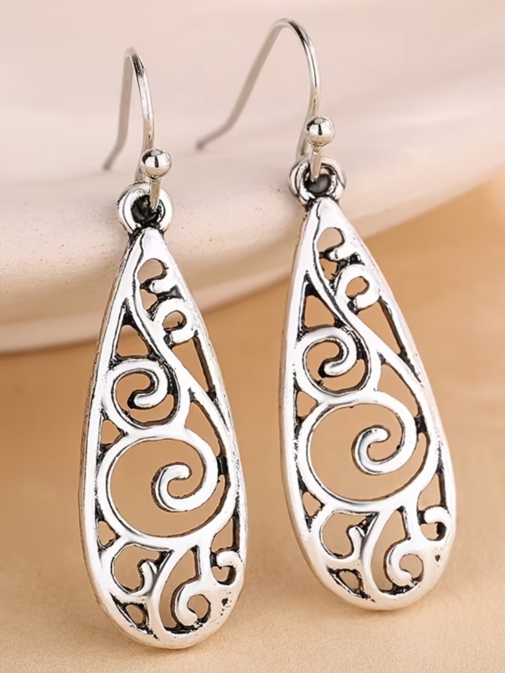 Swirl Oblong Silver Toned Dangle Earrings